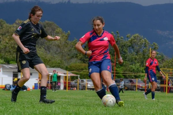 women soccer match action